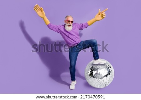 Full length collage photo of crazy mature man have fun at nightclub step on huge disco ball isolated on violet color background