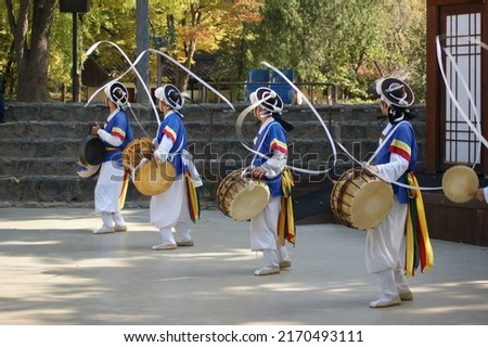 Samul nori  is a genre of percussion music that originated in Korea. The word samul means "four objects", while nori means "play". It is performed with four traditional Korean musical instruments. Royalty-Free Stock Photo #2170493111
