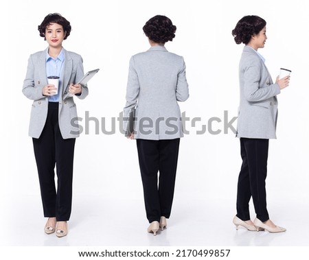 Full length 30s 40s Asian Woman teacher manager business, 360 turn front side back rear, wear formal blazer pants shoes. Smile Office female carry laptop coffee cup over white background isolated
