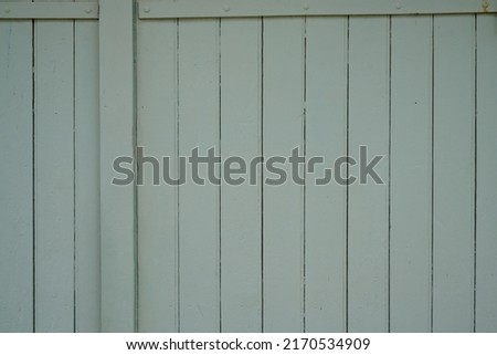green wooden planks background old ancient fence wood vertical plank panel