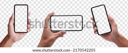 Hand holding the black smartphone phone with blank screen and modern frameless design, hold Mobile phone on transparent background Ideal for marketing, app design, UI and UX - include clipping path. Royalty-Free Stock Photo #2170542205