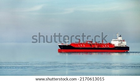 Side view oil and gas petrochemical tanker offshore in opensea, Refinery industry cargo ship, Oil product tanker and LPG tanker at sea view from above, Aerial view oil tanker ship vessel. Royalty-Free Stock Photo #2170613015