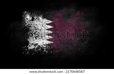 brush painted flag of Qatar isolated on black background
