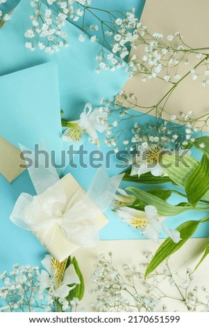 Concept of wedding invitation on blue background
