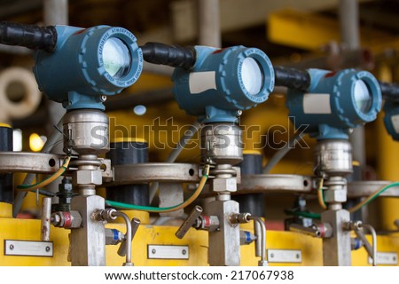 Pressure transmitter in oil and gas process , send signal to controller and reading pressure in the system. Royalty-Free Stock Photo #217067938
