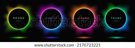 Blue, red-purple, green illuminate light frame collection design. Abstract cosmic vibrant color circle border. Top view futuristic style. Set of glowing neon lighting isolated on black background. Royalty-Free Stock Photo #2170723221
