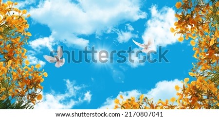 stretch ceiling decoration picture. yellow flowers,  white doves flying in the blue sky. bottom up view of the sky