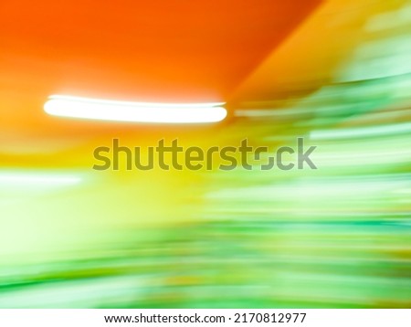 Motion blur with zoom effect long speed metro station as abstract blur background. 

