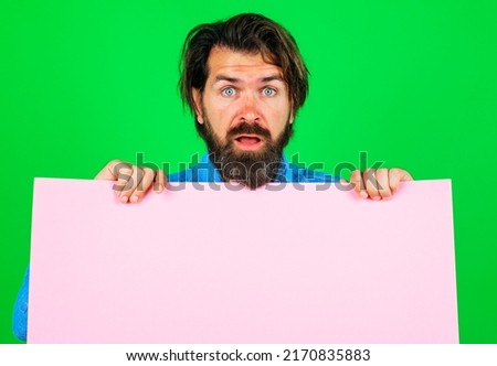 Surprised bearded man with empty board. Online shopping. Advertising banner. Season sales.