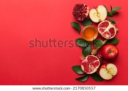 Flat lay composition with symbols jewish Rosh Hashanah holiday attributes on colored background, Rosh hashanah concept. New Year holiday Traditional. Top view with copy space. Royalty-Free Stock Photo #2170850557