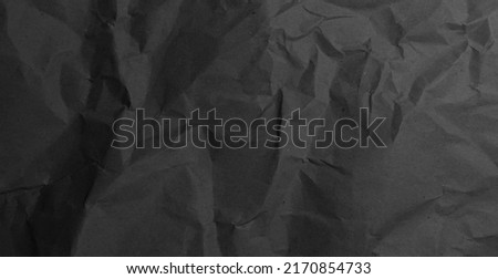 Close-up black paper, background, macro.