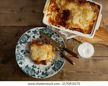 Meat lasagna with meat lasagna sharing scene