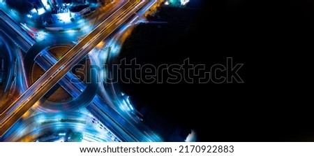 Aerial view of car traffic transportation above circle roundabout road of Drone aerial view fly , high angle. Public transport or commuter city life concept of economic and energy, infrastructure	 Royalty-Free Stock Photo #2170922883