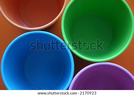 Top view of four colored plastic cups. Royalty-Free Stock Photo #2170923