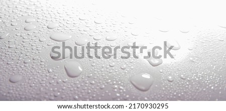 natural water drop texture. Full Frame Shot Of Water Drops On White Table Royalty-Free Stock Photo #2170930295