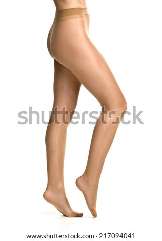 female legs in pantyhose in front of white