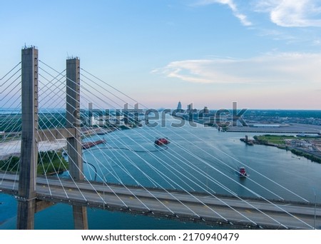The Mobile, Alabama port and the Cochrane Bridge at sunset in June of 2022 