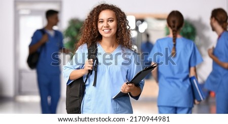 African-American student in hall of medical university