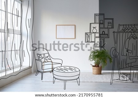New interior of stylish living room with armchair, pouf and rack with clothes