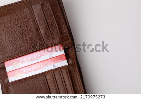 Yogyakarta, Indonesia - June 14, 2022 : Indonesian driving license in a pocket or wallet