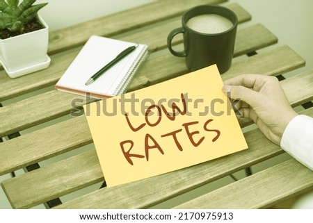 Inspiration showing sign Low Rates. Internet Concept A cost of an item or service which is usualy at its smallest price -47963