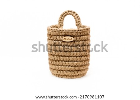 jute wicker basket isolated on white background, eco friendly container for home and interior,