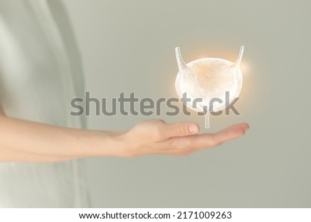 Unrecognizable female patient in white clothes, highlighted handrawn bladder in hands. Human renal system issues concept. Royalty-Free Stock Photo #2171009263