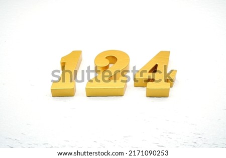    Number 124 is made of gold-plated teak, 1 cm thick, laid on a white painted aerated brick floor, giving good 3D visibility.                                