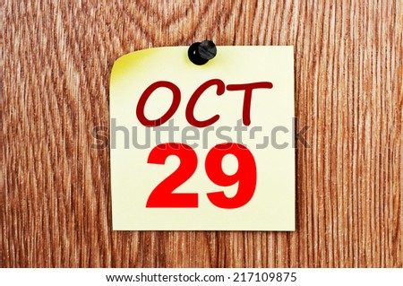 October 29 calendar. Note paper on a message board