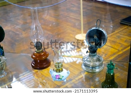 Vintage kerosene lamp on the table
