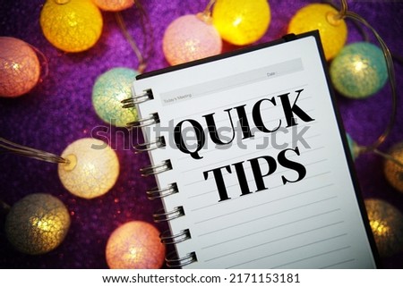 Quick Tips text message on notepad background