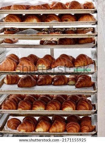 fresh croissants and pastries at the market Royalty-Free Stock Photo #2171155925