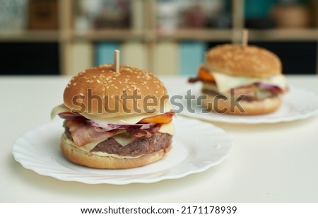 Big and appetizing homemade burgers on the table