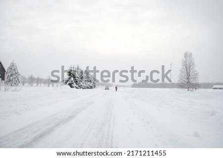Scenic image of spruces tree. Snowy road, calm wintry scene. Ski resort. Great picture of wild area. Explore the beauty of earth. Tourism concept. Christmas and Happy New Year!