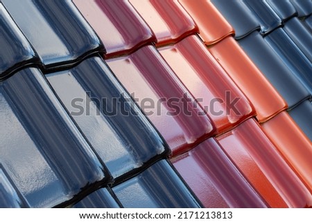 Roof tiles, variety of color shades, close-up Royalty-Free Stock Photo #2171213813