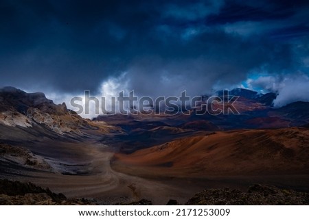 Haleakala National Park. View of volcanic crater with clouds rolling in. Maui, Hawaii. Royalty-Free Stock Photo #2171253009