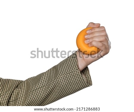 Woman squeezing antistress ball on white background, closeup Royalty-Free Stock Photo #2171286883