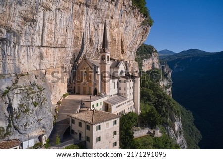 Madonna della Corona Sanctuary view, surrounded by mountains. Church in the rock, Santuario della Madonna della Corona. An old church, built around 1625, on a quiet, picturesque mountainside. Royalty-Free Stock Photo #2171291095