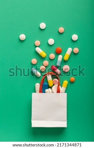 Various medicines, medical and pharmaceutical products in paper bags. Copy space. High quality photo Royalty-Free Stock Photo #2171344871