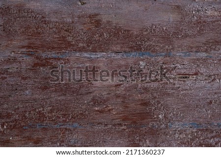 Cracked and dimpled wood planking grunge background texture