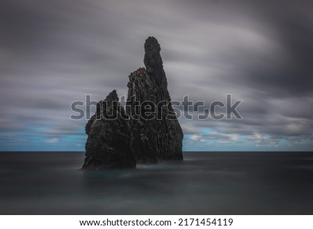 Volcanic rocky formation on Ribeira da Janela, Madeira, Portugal. October 2021. Long exposure picture in cloudy day.