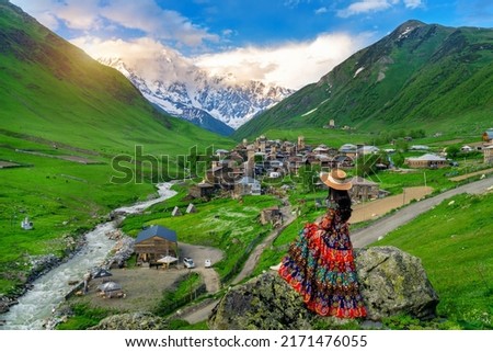 Tourist enjoy view of Ushguli village in Georgia. Royalty-Free Stock Photo #2171476055