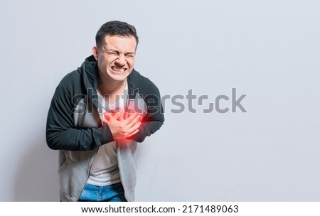 People with chest pain isolated, man with tachycardia, Man with heart pain on isolated background, young man with chest pain isolated Royalty-Free Stock Photo #2171489063