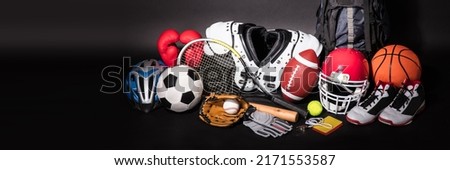 Close-up Of Various Sport Equipment Isolated On Black Background Royalty-Free Stock Photo #2171553587