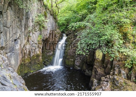 The Hollybush Spout waterfall pictured near Ingleton on the Ingleton Waterfalls Trail in North Yorkshire.
