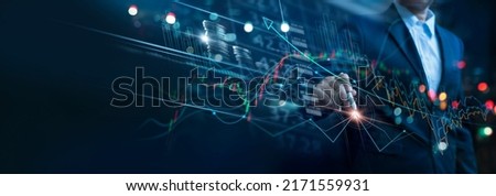Businessman touch investment growth graph chart and analysing growth achievement diagram data trading and exchange, Stock market, Investment, Banking and dynamics of financial growth of business Royalty-Free Stock Photo #2171559931