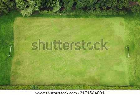 Aerial photo of the soccer field. Green grass. Concept of sport and background.