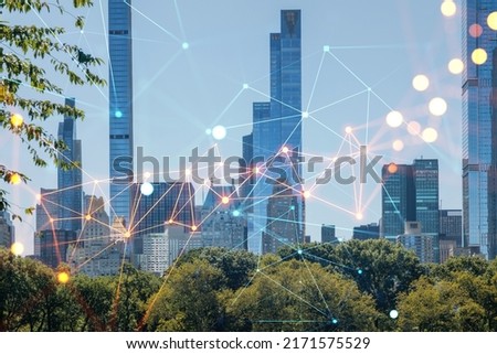 Green lawn at Central Park and Midtown Manhattan skyline skyscrapers at day time, New York City, USA. Social media hologram. Concept of networking and establishing new people connections Royalty-Free Stock Photo #2171575529