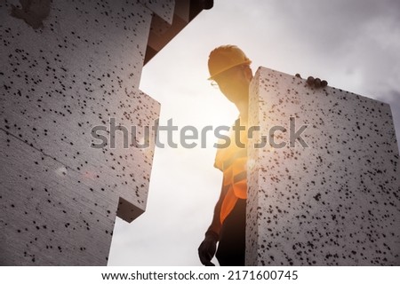 Polystyrene thermal cladding for energy saving on a construction site Royalty-Free Stock Photo #2171600745