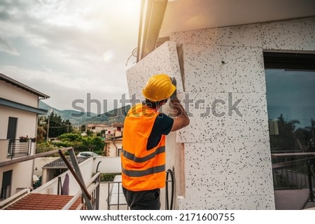 Polystyrene thermal cladding for energy saving on a construction site Royalty-Free Stock Photo #2171600755